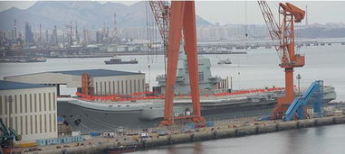 首艘國產(chǎn)航母甲板插上紅旗,這兩天下水可能性增大